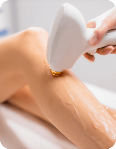 A person undergoing a laser hair removal treatment in a dental clinic setting.